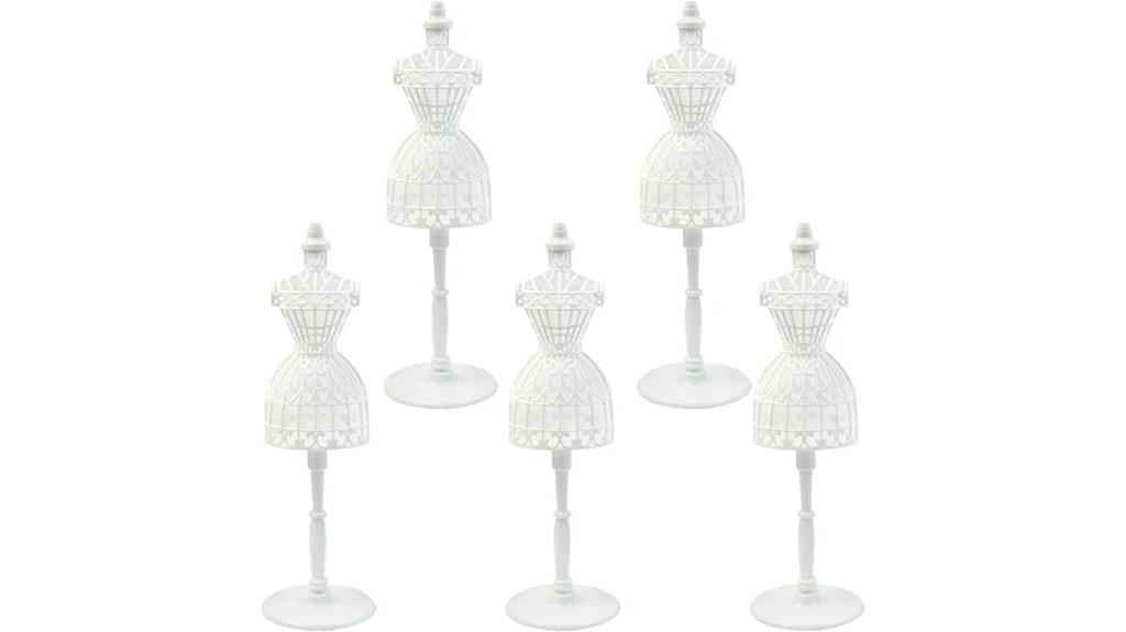 five plastic dress forms